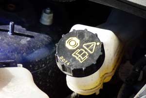 Ford Fiesta EcoBoost brake fluid reservoir inside the engine bay