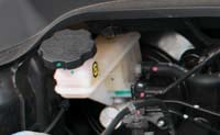 Hyundai i20 brake fluid reservoir inside the engine bay