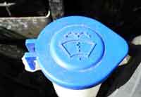 Suzuki Swift screen wash reservoir filler with blue cap