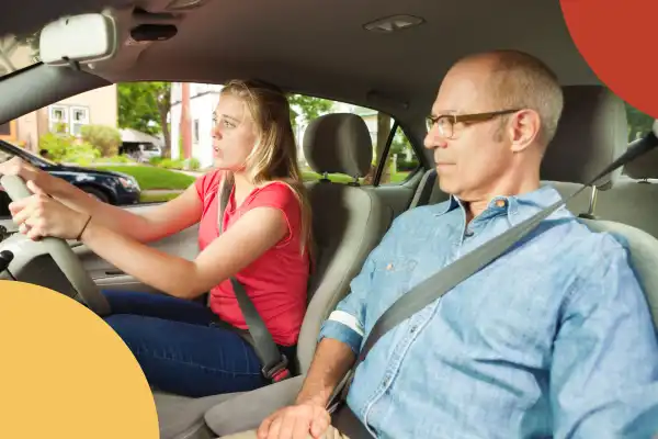 Learner driver practising with a parent or family member