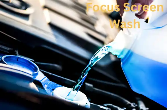Ford Focus screen wash reservoir being topped up