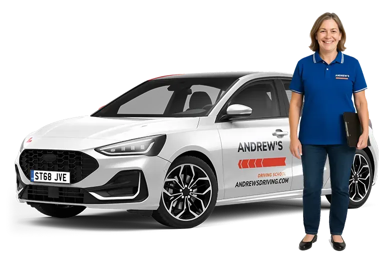 Andrew's Driving School instructor standing beside a branded tuition car