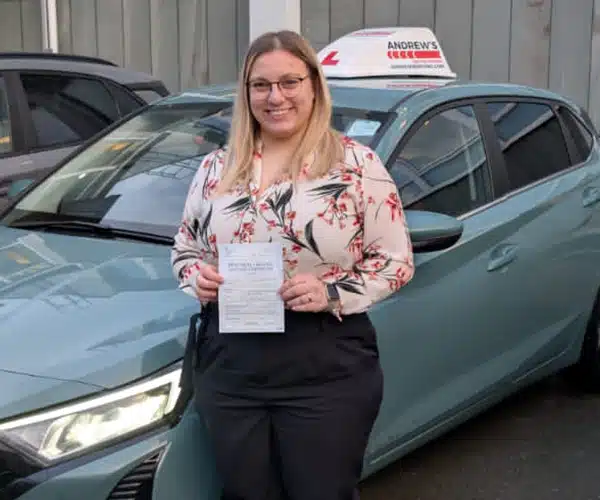 Andrea with Jacks car and her driving test pass