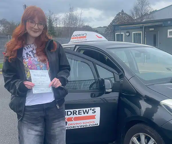 Carla celebrating a driving test pass in Bangor with Andrew's Driving School
