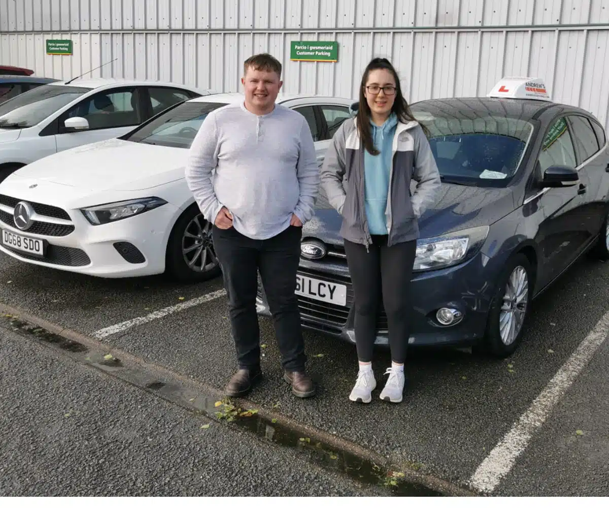 Dafydd Jones with his pupil after passing ADI Part 3 in Bangor