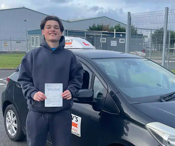 Happy looking Evan outside Bangor Driving Test Centre Gates