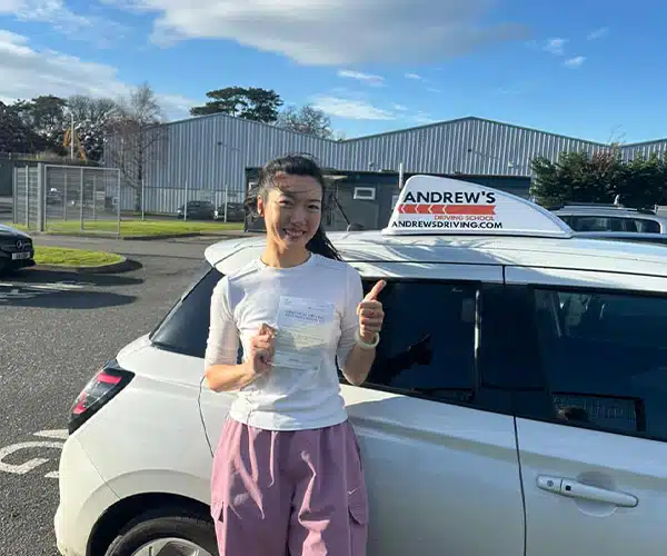 Grace giving a thumbs up in Bangor Driving Test Centre