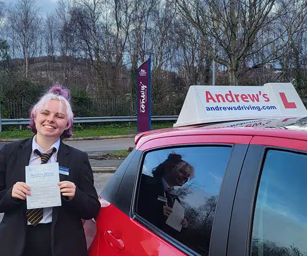 Holly smiling in Colwyn Bay after passiong the automatic driving test