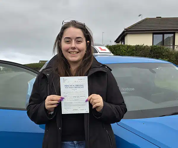 Smiling Jasmine in Colwwyn Bay after her driving test