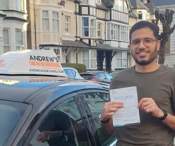 Khali in Llandudno, with his new driving test certificate