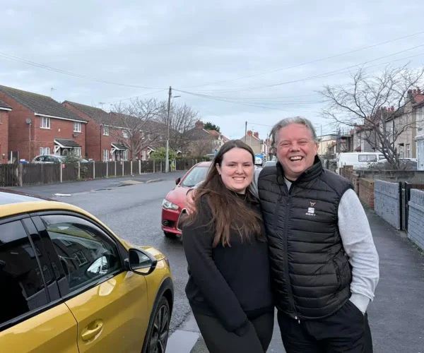 Paul Craft with his pupil outside Rhyl Driving Test Centre