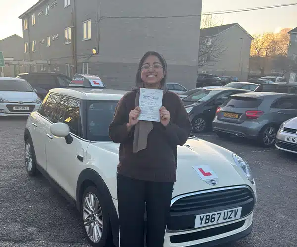 Newly qualified driver next to Jimmy Garlands automatic mini in Rhyl