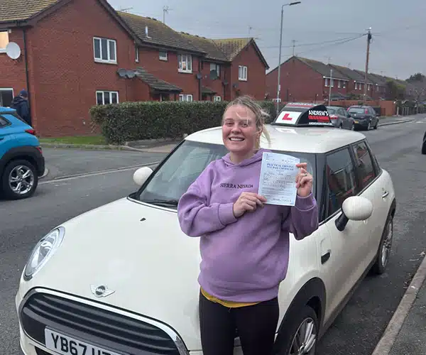 Happy learner in Rhyl with Driving Test pass certificate