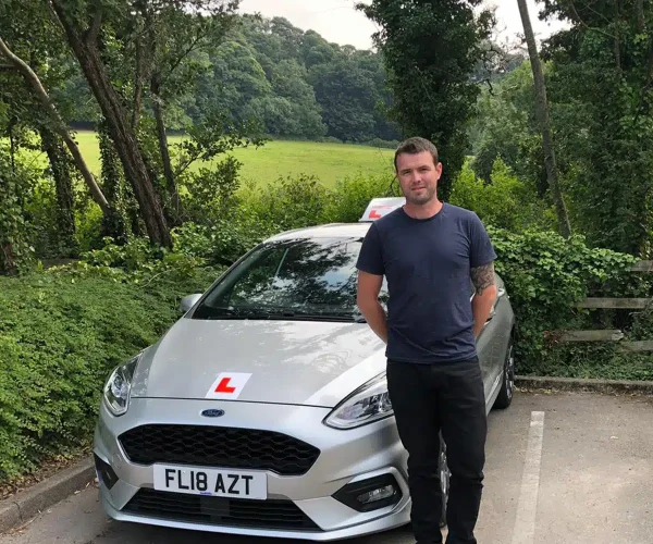 Shane Miron after completing and passing his driving instructor training assessment