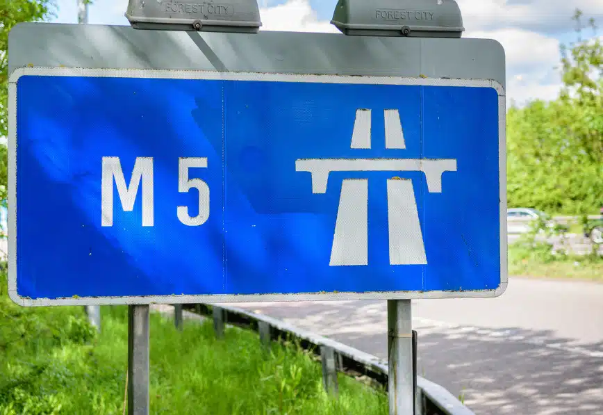 Blue start of motorway sign showing the motorway symbol