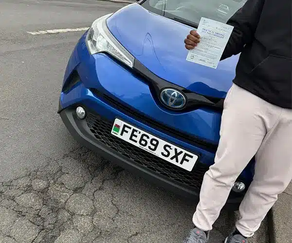 "Daves pass certificate by Fiona's Andrew's Driving Branded car in Rhyl"