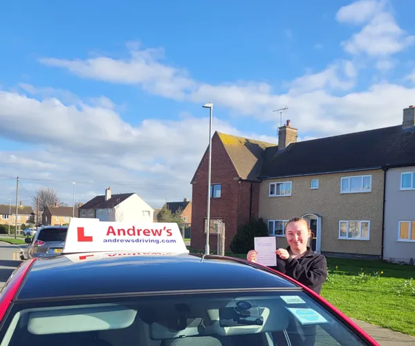 Jodie in a residential area of Abergele with Claires driving tuition car