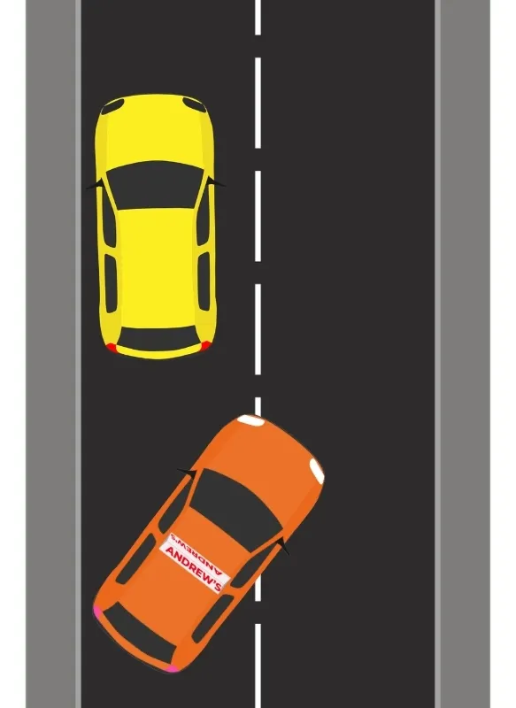 Car reversing at an angle towards the kerb during parallel parking
