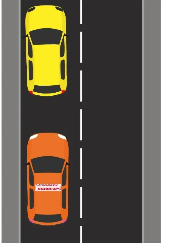 Car in the final parallel parking position behind a parked vehicle