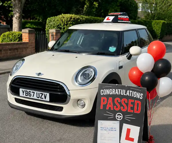 Oliver celebrates passing his driving test with Andrew's Driving School.